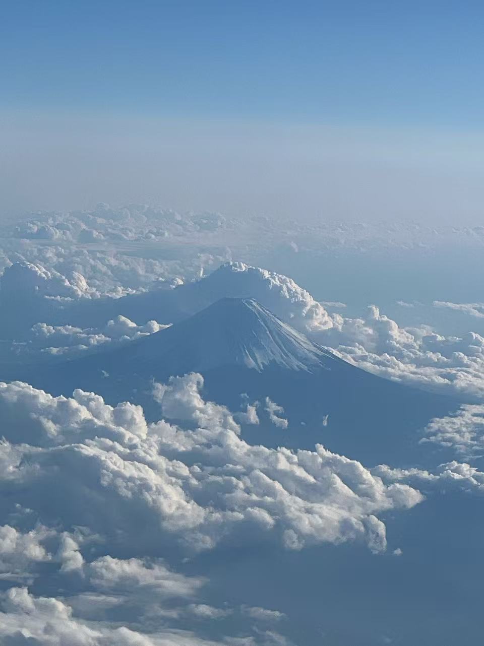 Mount Fuji above clouds