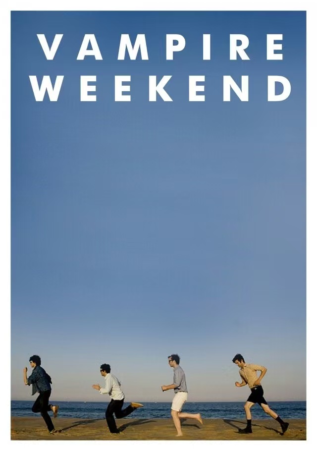 Vampire Weekend running on a beach